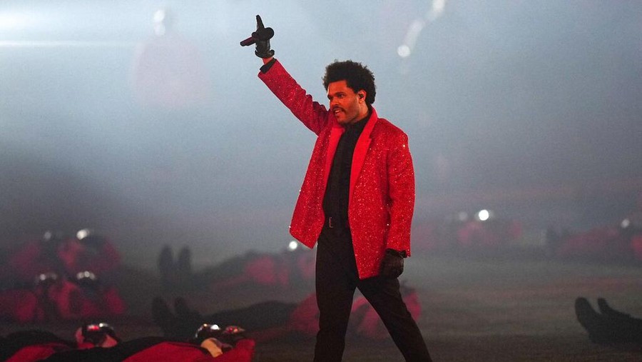 The Weeknd performs during halftime of the NFL Super Bowl 55 football game between during the halftime show of the NFL Super Bowl 55 football game between the Kansas City Chiefs and Tampa Bay Buccaneers, Sunday, Feb. 7, 2021, in Tampa, Fla. (AP Photo/David J. Phillip)