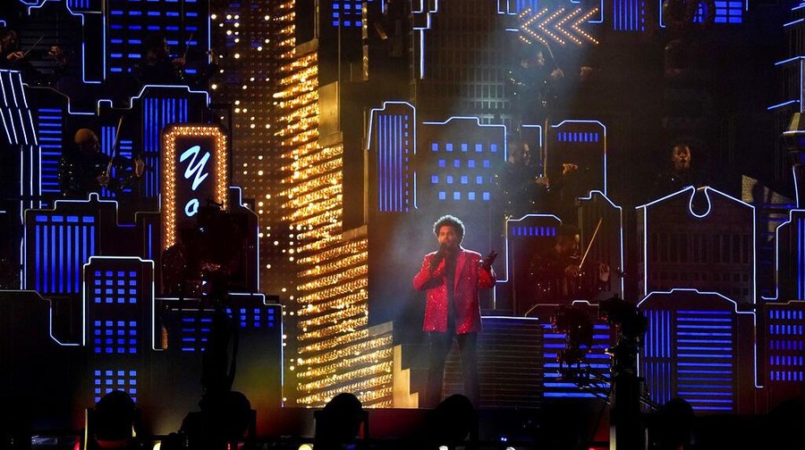 The Weeknd performs during halftime of the NFL Super Bowl 55 football game between during the halftime show of the NFL Super Bowl 55 football game between the Kansas City Chiefs and Tampa Bay Buccaneers, Sunday, Feb. 7, 2021, in Tampa, Fla. (AP Photo/Ashley Landis)
