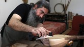 FOTO: Harmoni Persia dalam Petikan Dawai Tanbur dan Setar Mengenal Tanbur dan Setar, alat musik petik tradisional Persia yang masih dikenal hingga saat ini.