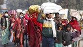 FOTO: Magh Mela, Upacara Mandi Bersihkan Dosa di India Magh Mela atau Magha Mela merupakan ritual penebusan dosa bagi umat Hindu di India dengan mandi di Sungai Sangam, Prayagraj, India.