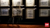 FOTO: Merekam Kehidupan Suku Baduy Lewat Goresan Kanvas Pameran lukisan bertema Suku Baduy karya perupa Jenny Mahastuti, di gedung Perpustakaan Nasional RI, jalan Merdeka Selatan, Jakarta Pusat, Kamis (11/2).