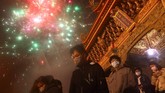 FOTO: Semarak Perayaan Imlek Dunia di Tengah Pandemi Covid-19 Dunia kembali merayakan tahun baru Cina atau imlek di tengah masa pandemi Covid-19 yang belum mereda, ada kebiasaan baru di tengah keramaian suka cita.