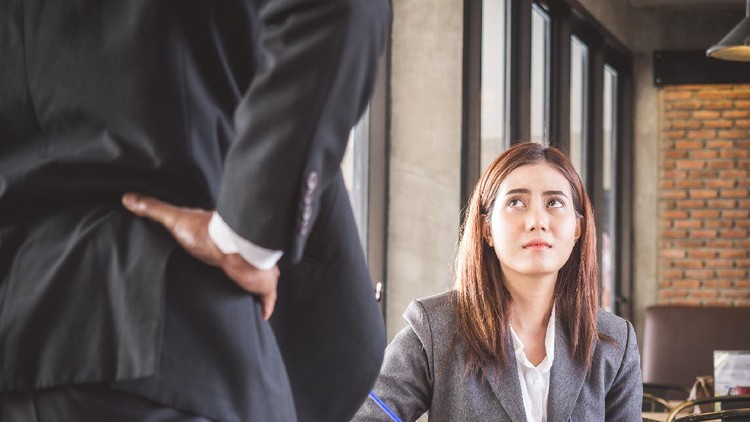Aggressive/angry boss complaining asian business woman(casual uniform) in cafe office