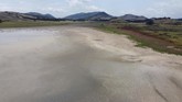FOTO: Kemarau dan Deforestasi, Laguna di Kolombia Mengering Cadangan air di Laguna Suesca di Kolombia menurun secara drastis dalam beberapa tahun terakhir akibat perubahan iklim dan kerusakan lingkungan.