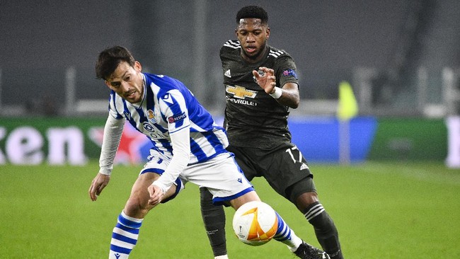 Manchester United lolos ke babak 16 besar Liga Europa setelah imbang tanpa gol melawan Real Sociedad pada leg kedua babak 32 besar pada Jumat (26/2).