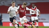 FOTO: Gilas Arsenal, Man City Tatap Peluang Juara Manchester City sukses merengkuh tiga poin di markas Arsenal. Gol tunggal Raheem Sterling membuat Man City kian kukuh di puncak klasemen.