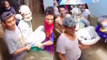Viral! Pasangan Pengantin Terjang Banjir dengan Bak Mandi Bayi & Ember