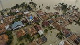 FOTO : Banjir di Bekasi-Karawang Imbas Tanggul Citarum Jebol Ribuan rumah di Bekasi-Karawang terendam banjir usai tanggul Sungai Citarum di Kecamatan Pebayuran, Kabupaten Bekasi, jebol pada Sabtu (20/2) malam.