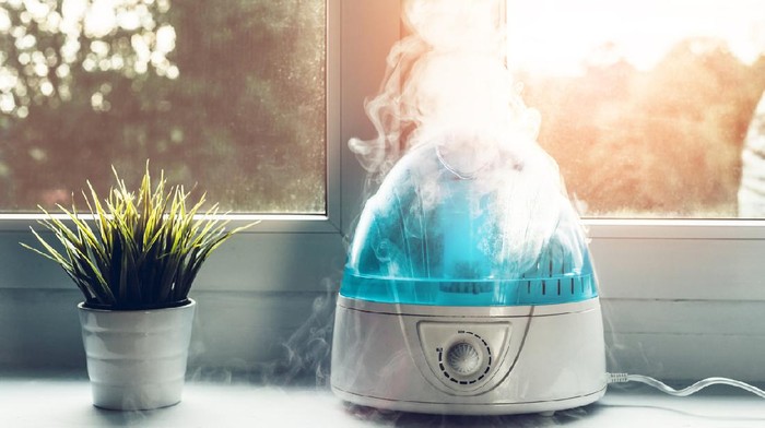The white humidifier moistens dry air. Improving the comfort of living in the home, apartment. Improving the well-being of people.