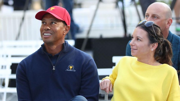 MELBOURNE, AUSTRALIA - DECEMBER 06:  Tiger Woods and his girlfriend Erica Herman look on during a Presidents Cup media opportunity at the Yarra Promenade on December 5, 2018 in Melbourne, Australia. The Presidents Cup 2019 will be held on December 9-15, 2019, when it returns to the prestigious Royal Melbourne Golf Club in Australia.  (Photo by Scott Barbour/Getty Images)
