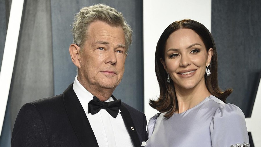 FILE - David Foster, left, and Katharine McPhee arrive at the Vanity Fair Oscar Party on Feb. 9, 2020, in Beverly Hills, Calif. The couple, who wed in 2019, have welcomed a baby boy, McPhee's publicist confirmed Wednesday, Feb. 24, 2021. (Photo by Evan Agostini/Invision/AP, File)