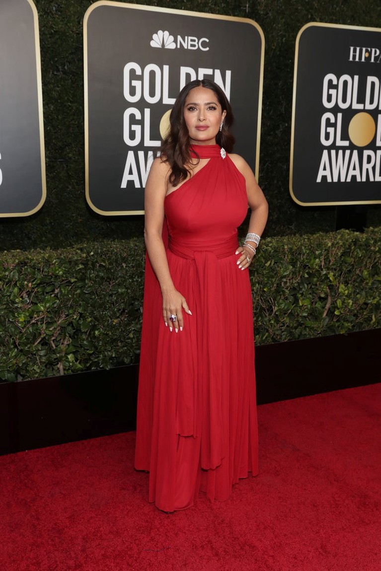 Actor Salma Hayek poses on the red carpet in this handout photo from the 78th Annual Golden Globe Awards in Beverly Hills, California, U.S., February 28, 2021. Todd Williamson/NBC Handout via REUTERS ATTENTION EDITORS - THIS IMAGE HAS BEEN SUPPLIED BY A THIRD PARTY. NO RESALES. NO ARCHIVES.