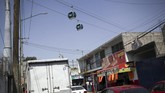 FOTO: Mexico City Luncurkan Cablebus, Kereta Gantung Terbaru Mexico City baru saja meluncurkan kereta gantung pertamanya untuk melayani sekitar 9 juta warga ibu kota. Sistem angkutan umum udara ini dijuluki