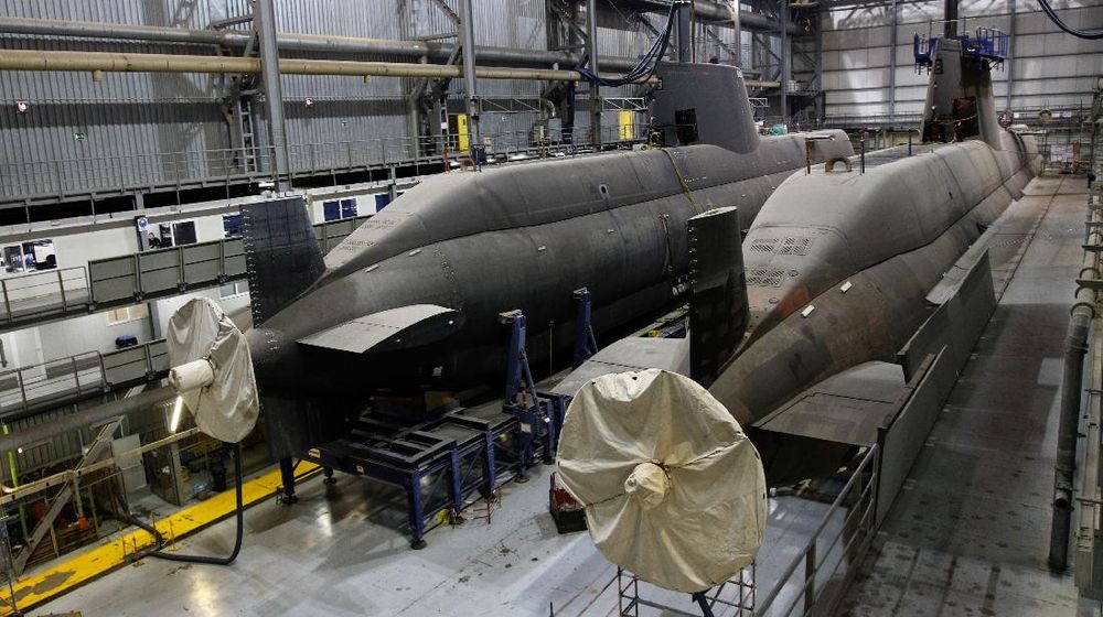 Two, type 214 submarines nearing completion are seen at the Skaramangas  Shipyard in Athens on Wednesday Nov. 3, 2010. Abu Dhabi Mar group (ADM) is the first foreign company to make a major investment in Greece since the start of the country's debt crisis, by buying the Greek shipbuilder. (AP Photo/Dimitri Messinis)