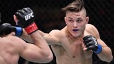 FOTO: UFC 259 Jadi Bencana Israel Adesanya UFC 259 menjadi ajang bencana bagi Israel Adesanya yang kalah dari Jan Blachowicz dalam perebutan gelar light heavyweight.