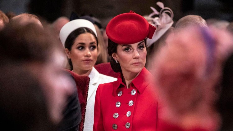 LONDON, ENGLAND - MARCH 11: Catherine, The Duchess of Cambridge sits near Meghan, Duchess of Sussex as they attend the Westminster Abbey Commonwealth day service on March 11, 2019 in London, England. Commonwealth Day has a special significance this year, as 2019 marks the 70th anniversary of the modern Commonwealth, with old ties and new links enabling cooperation towards social, political and economic development which is both inclusive and sustainable. The Commonwealth represents a global network of 53 countries and almost 2.4 billion people, a third of the worlds population, of whom 60 percent are under 30 years old. Each year the Commonwealth adopts a theme upon which the Service is based. This years theme A Connected Commonwealth speaks of the practical value and global engagement made possible as a result of cooperation between the culturally diverse and widely dispersed family of nations, who work together in friendship and goodwill. The Commonwealths governments, institutions and people connect at many levels, including through parliaments and universities. They work together to protect the natural environment and the ocean which connects many Commonwealth nations, shore to shore. Cooperation on trade encourages inclusive economic empowerment for all people - particularly women, youth and marginalised communities. The Commonwealths friendly sporting rivalry encourages people to participate in sport for development and peace. (Photo by Richard Pohle - WPA Pool/Getty Images)
