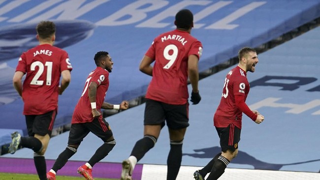 Pertandingan leg pertama babak 16 besar Liga Europa antara kesebelasan Manchester United dan AC Milan berakhir dengan skor 1-1.