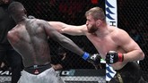 FOTO: UFC 259 Jadi Bencana Israel Adesanya UFC 259 menjadi ajang bencana bagi Israel Adesanya yang kalah dari Jan Blachowicz dalam perebutan gelar light heavyweight.
