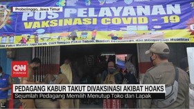 VIDEO: Termakan Hoax,Pedagang Pasar Kabur Saat Akan Divaksin