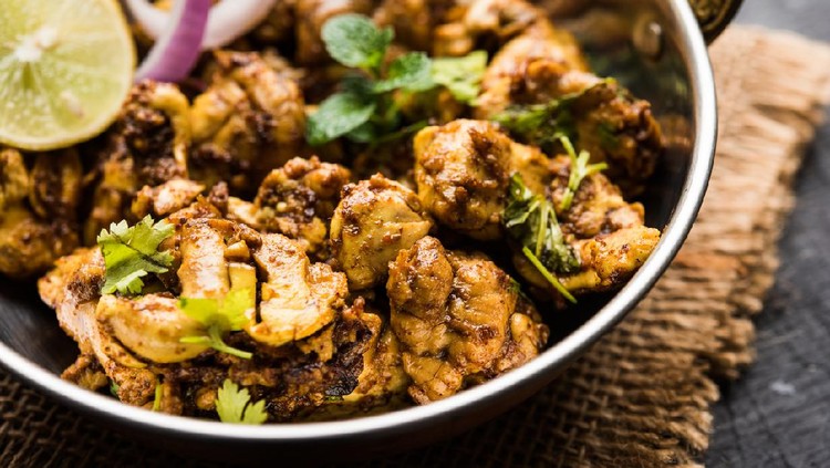 Brain / Bheja Fry of goat, sheep or lamb is a popular Indian or pakistani dish cooked on Bakra Eid(Eid-ul-zuha). served in karahi, pan or plate. selective focus
