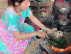 Wanita Cantik Ini Jago Mancing di Empang hingga Masak Pakai Kayu Bakar