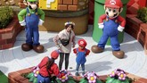 FOTO: Keseruan Bermain di Taman Hiburan Super Nintendo World Taman hiburan Super Nintendo World akhirnya dibuka. Kini Mario Kart sampai Peach's Castle bisa disambangi di dunia nyata.