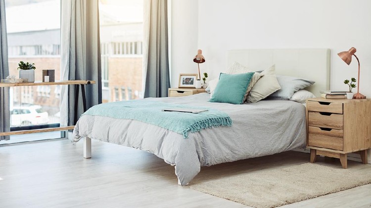 Cropped shot of an empty and neatly arranged bedroom at home during the day