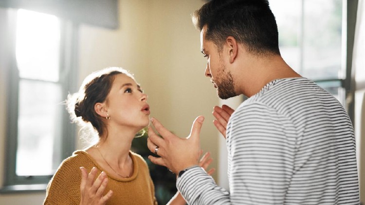 Cropped shot of a young couple having an argument at home