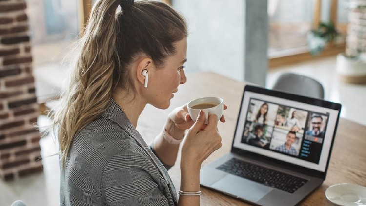 Women at home during pandemic isolation have conference  call