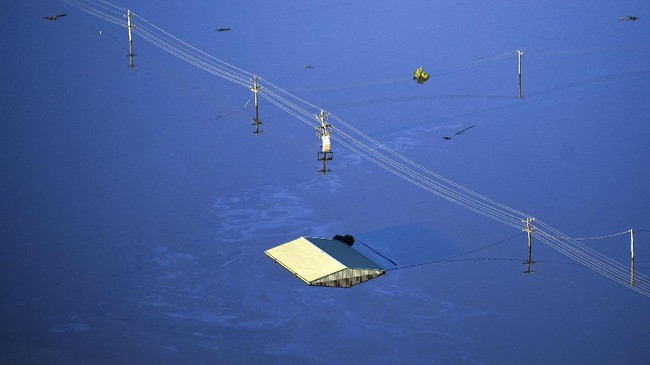 FOTO: Ribuan Orang Masih Terjebak Banjir di Australia