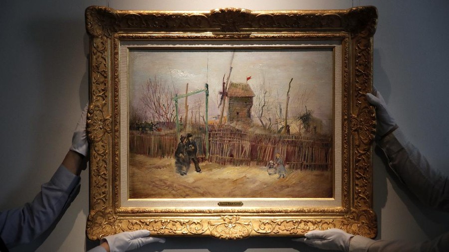 France Van Gogh FILE- In this Feb. 25, 2021, file photo, Sotheby's personnel display « Scene de rue à Montmartre » (Street scene in Montmartre), a painting by Dutch master Vincent van Gogh at Sotheby's auction house in Paris. A rare painting by Vincent Van Gogh is being put up for auction by Sotheby's Paris on Thursday, and is expected to sell for many millions. (AP Photo/Christophe Ena, File)