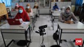 FOTO: Jelang Sekolah Tatap Muka di Masa Pandemi Sekolah mulai melakukan simulasi pembelajaran hybrid atau gabungan Pembelajaran Jarak Jauh (PJJ) dan tatap muka jelang buka sekolah Juli 2021.