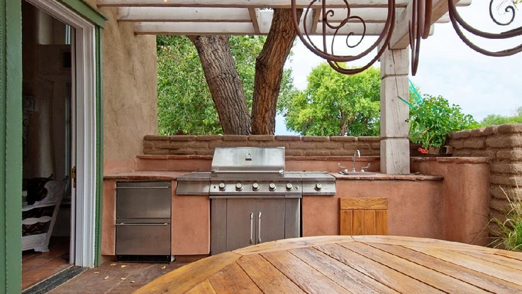 Outdoors Kitchen with Built-In gas grill on a deck