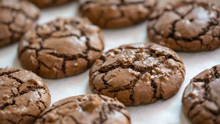 Closed up of brownie cookies on the baking plate. Food background, bakery and dessert.