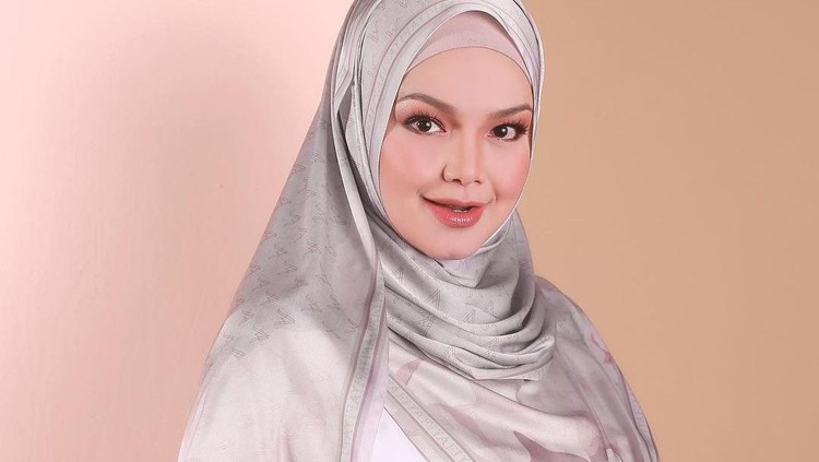 Siti Nurhaliza Siti Nurhaliza baru merilis produk hijab.