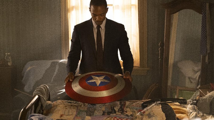 (L-R): Rhodey (Don Cheadle) and Falcon/Sam Wilson (Anthony Mackie)  in Marvel Studios' THE FALCON AND THE WINTER SOLDIER exclusively on Disney+. Photo courtesy of Marvel Studios. ©Marvel Studios 2021. All Rights Reserved.