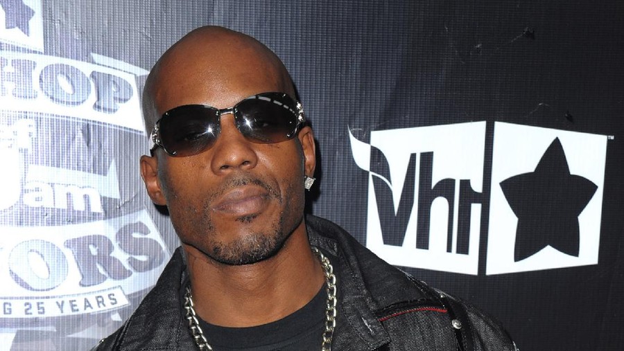 Obit DMX FILE - DMX, center, accepts the R&B Album Artist of the Year during the 1999 Billboard Music Awards in Las Vegas, on Dec. 8, 1999. The family of rapper DMX says he has died at age 50 after a career in which he delivered iconic hip-hop songs such as “Ruff Ryders’ Anthem." A statement from the family says the Grammy-nominated rapper died at a hospital in White Plains, New York, "with his family by his side" after being placed on life support for the past few days. He was rushed to a New York hospital from his home April 2. (AP Photo/Laura Rauch, File)