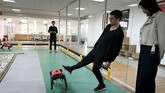 FOTO: Robot Anjing Peliharaan Bisa Diajak Jalan-jalan Perusahaan China berhasil membuat robot anjing peliharan dengan menggunakan teknologi kecerdasan buatan.