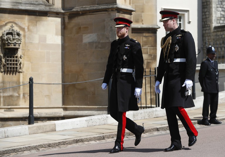 FILE - In this file photo dated Sunday, Feb. 5, 2017, Britain's Prince Harry, right, races to the line against Prince William, and Kate, the Duchess of Cambridge, left, during a training event to promote their charity Heads Together, at the Queen Elizabeth II Park in London.  Many observers believe that the upcoming funeral for Prince Philip, on Saturday April 17, 2021, will provide an ideal opportunity for the brothers to smooth over tensions.(AP Photo/Alastair Grant, Pool)