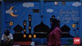 FOTO: Kampung Ramadan di Tengah Pencakar Langit Jakarta Walau masih dilanda pandemi Covid-19, warga Jakarta tetap menyambut Ramadan dengan gembira. Salah satunya di Kampung Ramadan.
