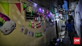 FOTO: Kampung Ramadan di Tengah Pencakar Langit Jakarta Walau masih dilanda pandemi Covid-19, warga Jakarta tetap menyambut Ramadan dengan gembira. Salah satunya di Kampung Ramadan.