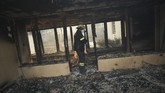 FOTO: Si Jago Merah Lalap Bangunan Bersejarah Afrika Selatan Kebakaran hutan di Cape Town, Afrika Selatan, menghanguskan dua bangunan bersejarah.
