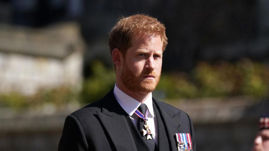 WINDSOR, ENGLAND - APRIL 17: Prince Harry arrives for the funeral of Prince Philip, Duke of Edinburgh at St George's Chapel at Windsor Castle on April 17, 2021 in Windsor, England. Prince Philip of Greece and Denmark was born 10 June 1921, in Greece. He served in the British Royal Navy and fought in WWII. He married the then Princess Elizabeth on 20 November 1947 and was created Duke of Edinburgh, Earl of Merioneth, and Baron Greenwich by King VI. He served as Prince Consort to Queen Elizabeth II until his death on April 9 2021, months short of his 100th birthday. His funeral takes place today at Windsor Castle with only 30 guests invited due to Coronavirus pandemic restrictions. (Photo by Victoria Jones - WPA Pool/Getty Images)