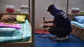 FOTO: Arena Olahraga Bangkok Disulap Jadi RS Corona Pemerintah Thailand mengubah sejumlah tempat di Bangkok menjadi rumah sakit darurat virus corona.