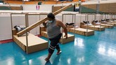 FOTO: Arena Olahraga Bangkok Disulap Jadi RS Corona Pemerintah Thailand mengubah sejumlah tempat di Bangkok menjadi rumah sakit darurat virus corona.