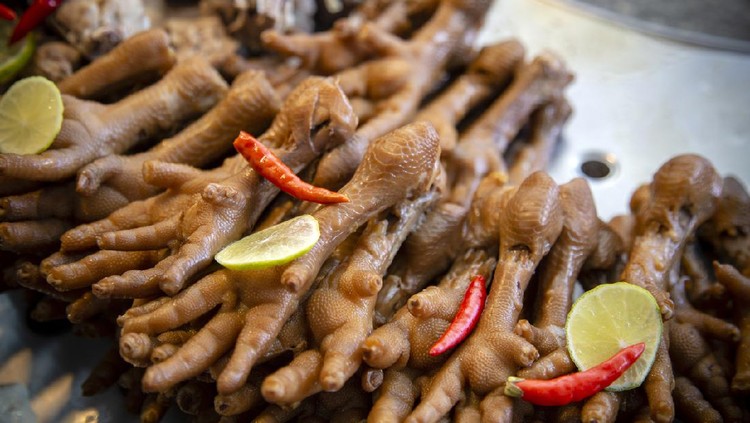 Thai Chinese style steamed cooked chicken feet at a street food market in Phuket, Thailand.