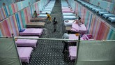 FOTO: India Keteteran Hadapi Lonjakan Kasus Covid-19 India terus mengalami lonjakan kasus infeksi virus corona (Covid-19). Jumlah kasusnya kini peringkat dua di dunia.