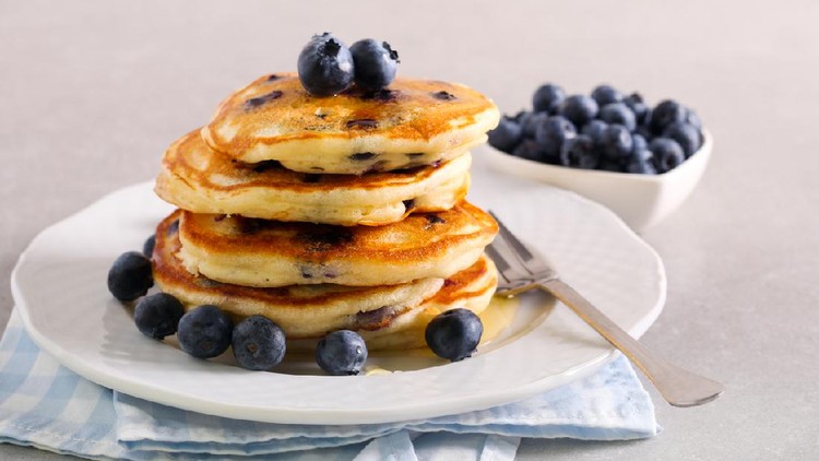 Blueberry pancakes, served on plate
