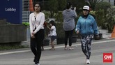 FOTO: Gelagat Ibu Kota Menanti Berbuka Puasa Warga Jakarta menunggu waktu berbuka puasa dengan berbagai macam aktivitas di sekitar Jalan Sudirman, Jakarta Pusat.