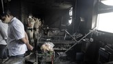 FOTO: Si Jago Merah Merenggut Belasan Nyawa di RS Covid India Setidaknya 13 orang tewas akibat kebakaran di salah satu rumah sakit yang merawat pasien Covid-19 di India pada Jumat (23/4).